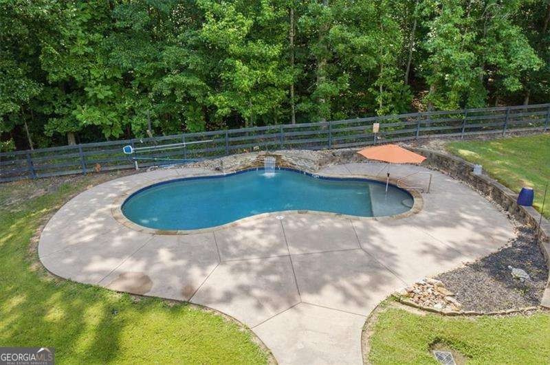 Minutes from Lake Allatoona, tucked on 3.42 private acres, this - photo 30