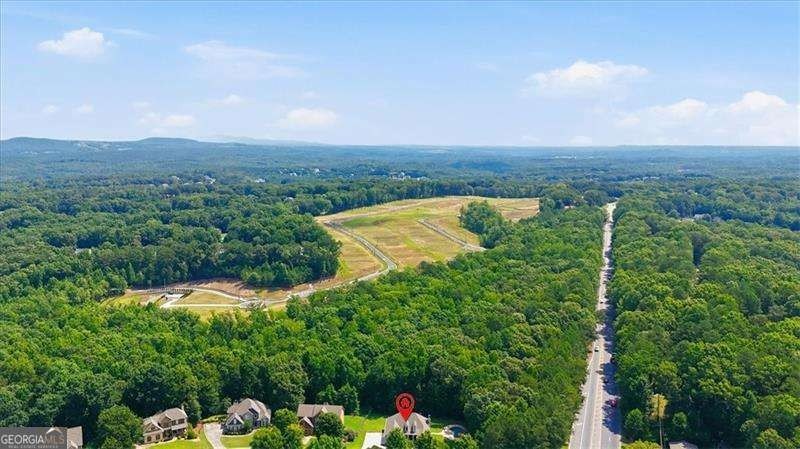Minutes from Lake Allatoona, tucked on 3.42 private acres, this - photo 36