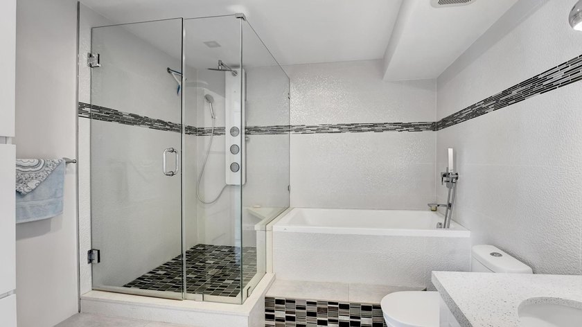 Experience oceanfront living at its finest in this beautifully - photo 17