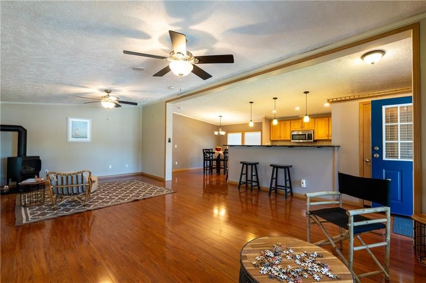 This single level 1400+ sq.ft. open living floorplan is light - photo 9