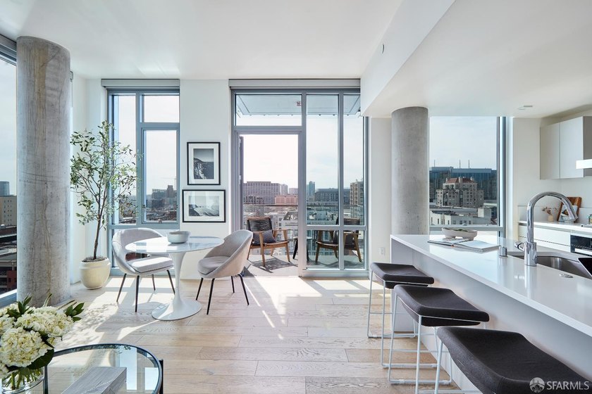 Situated on the 11th floor, this luminous two-bedroom, two-bath - photo 2