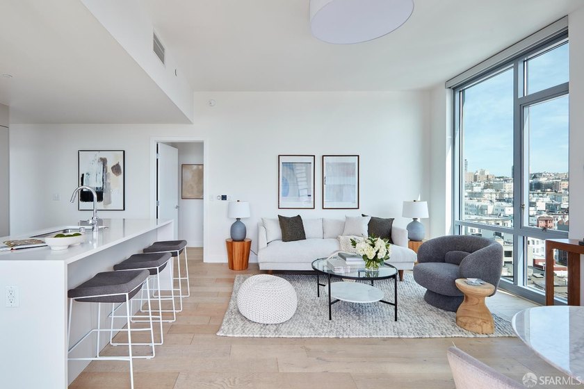 Situated on the 11th floor, this luminous two-bedroom, two-bath - photo 4