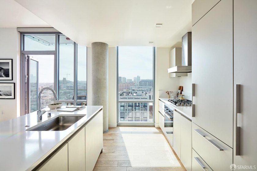 Situated on the 11th floor, this luminous two-bedroom, two-bath - photo 7