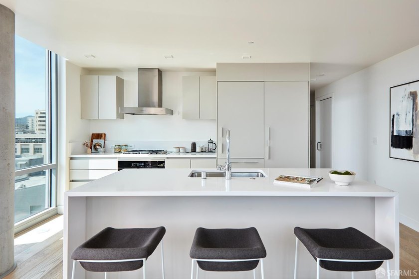 Situated on the 11th floor, this luminous two-bedroom, two-bath - photo 8