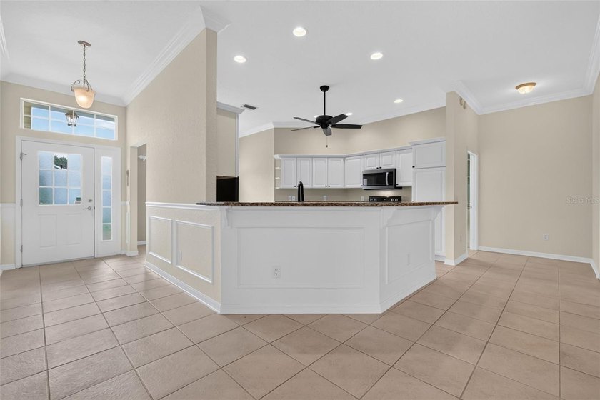 Nestled on a LARGE CORNER LOT in the highly coveted village of - photo 10