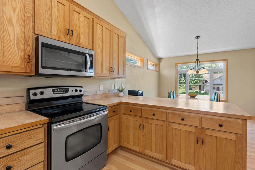 Bright, open, and overlooking the pond, this home offers a - photo 13