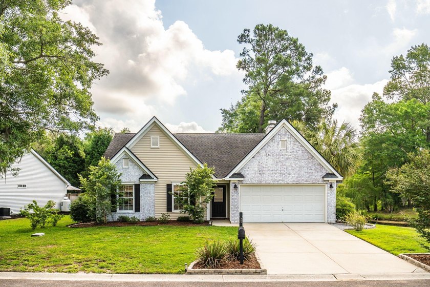 Nestled in the charming Sugar Magnolia section of Grand Oaks - photo 4
