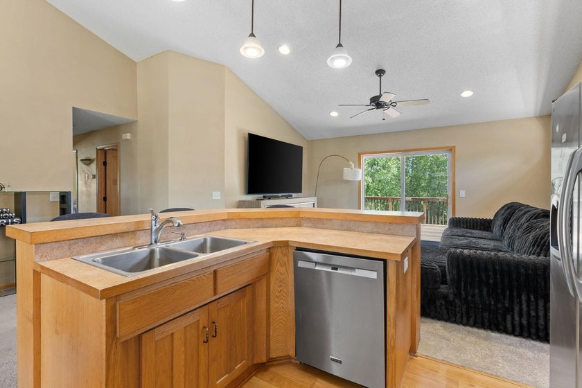 Bright, open, and overlooking the pond, this home offers a - photo 14