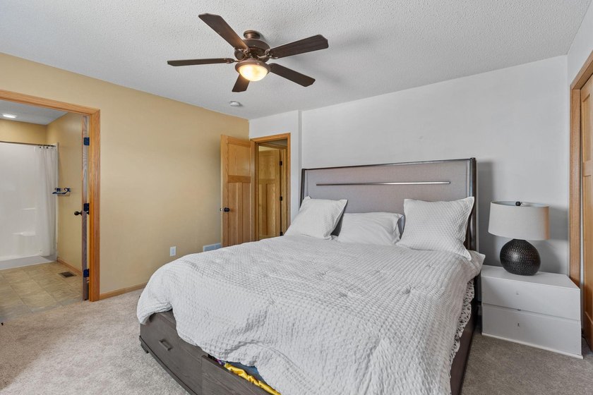 Bright, open, and overlooking the pond, this home offers a - photo 19