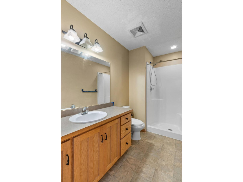 Bright, open, and overlooking the pond, this home offers a - photo 21