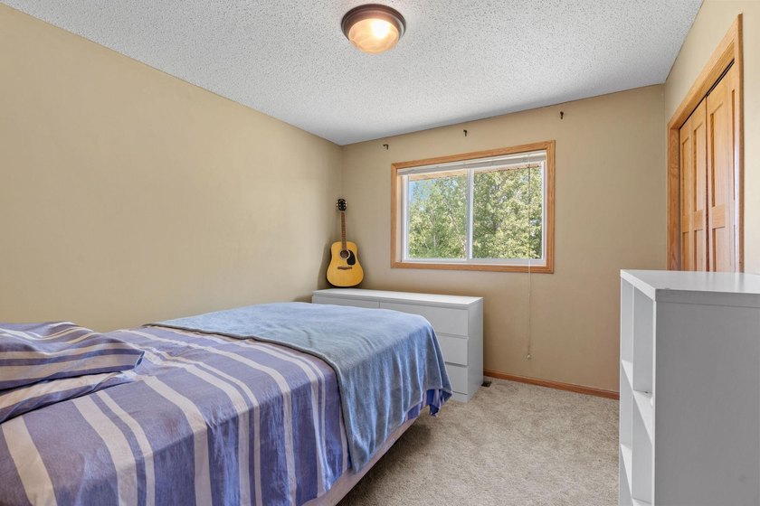 Bright, open, and overlooking the pond, this home offers a - photo 23