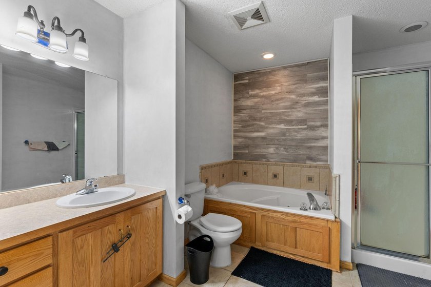 Bright, open, and overlooking the pond, this home offers a - photo 27