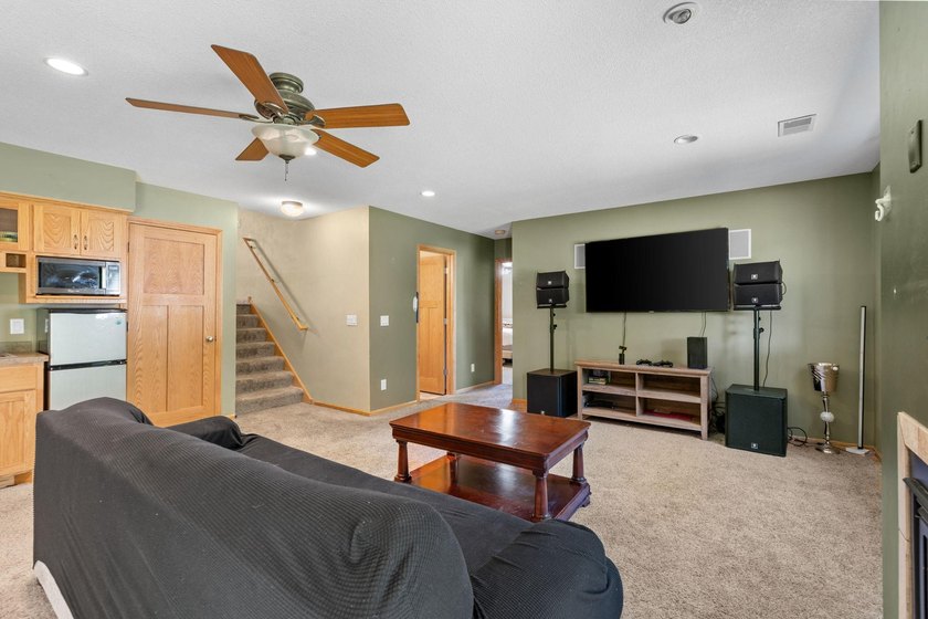 Bright, open, and overlooking the pond, this home offers a - photo 32