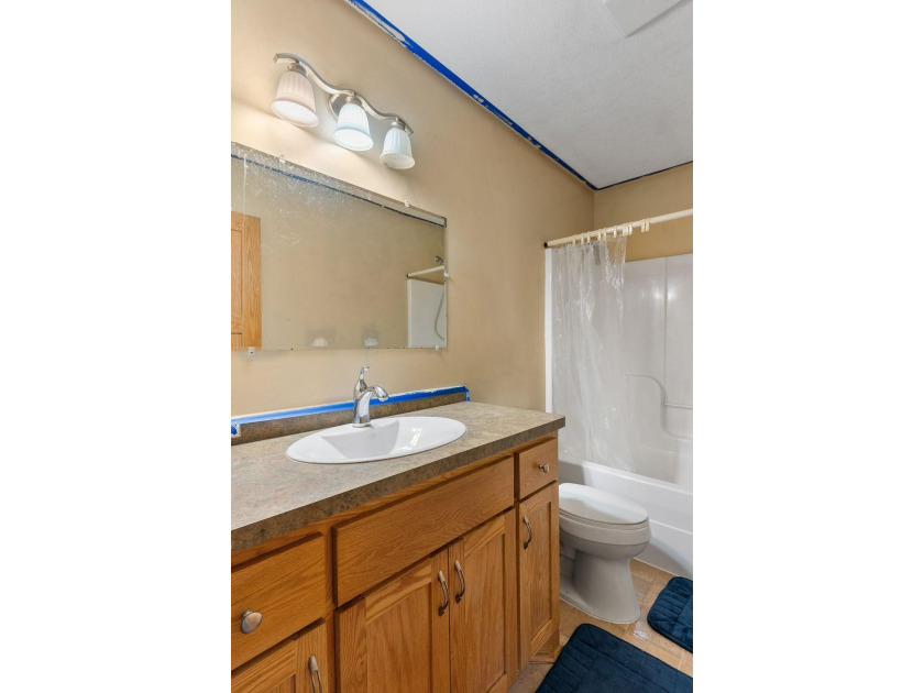 Bright, open, and overlooking the pond, this home offers a - photo 41