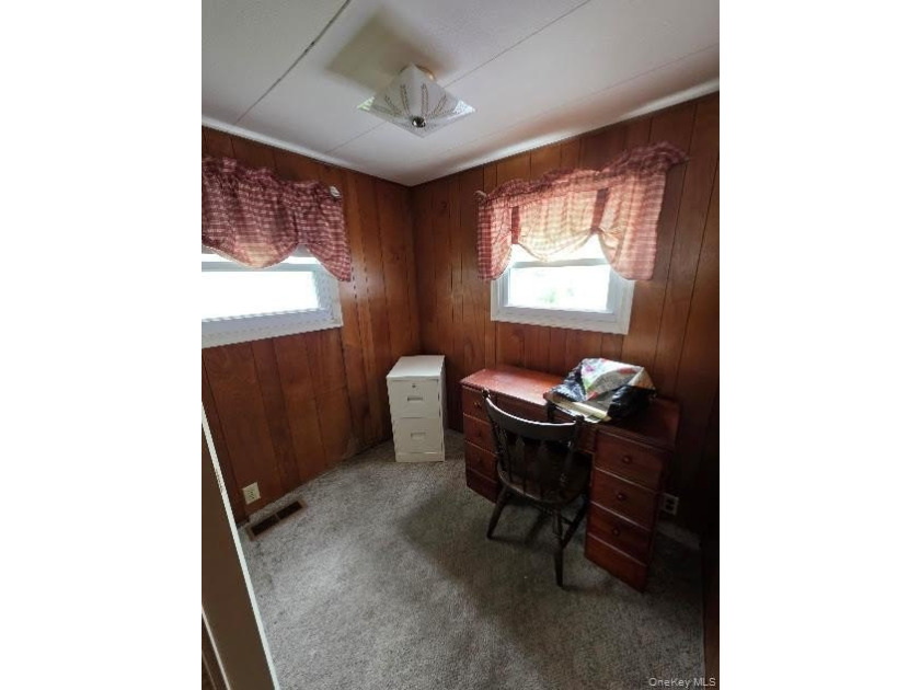 Spacious 3-bedroom, 1.5-bath mobile home filled with charm - photo 11