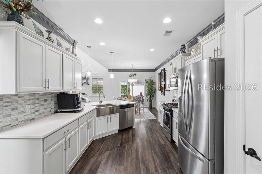 Welcome to this exceptional 4-bedroom, 2.5-bath home in the - photo 23