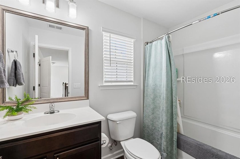 Welcome to this exceptional 4-bedroom, 2.5-bath home in the - photo 36