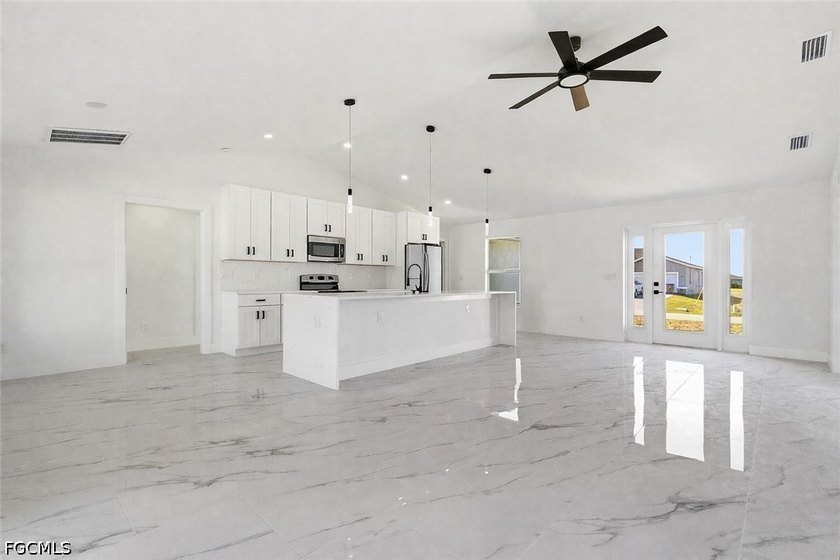 There's a quiet confidence about this home-the kind you feel the - photo 3