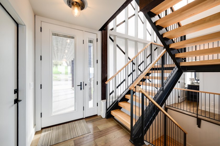 Lakefront luxury meets architectural distinction in this - photo 17