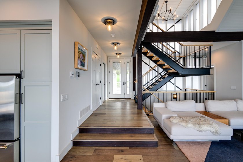 Lakefront luxury meets architectural distinction in this - photo 18