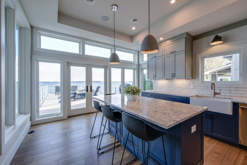 Lakefront luxury meets architectural distinction in this - photo 23