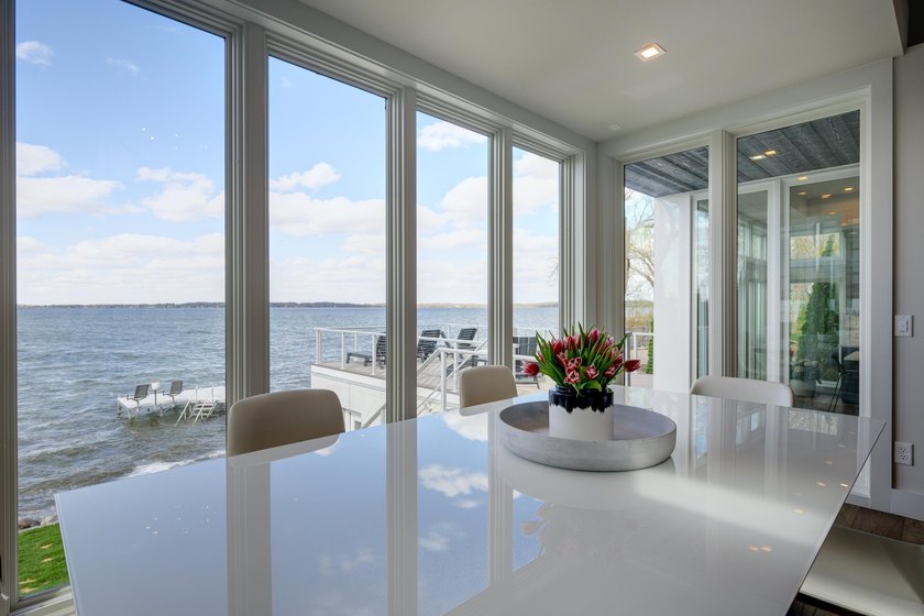 Lakefront luxury meets architectural distinction in this - photo 27