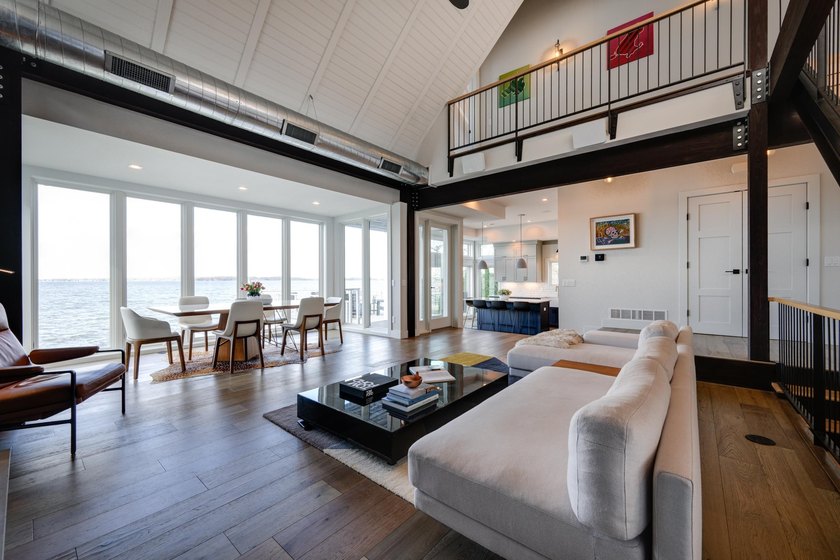 Lakefront luxury meets architectural distinction in this - photo 29