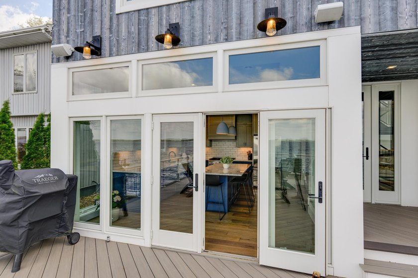 Lakefront luxury meets architectural distinction in this - photo 31