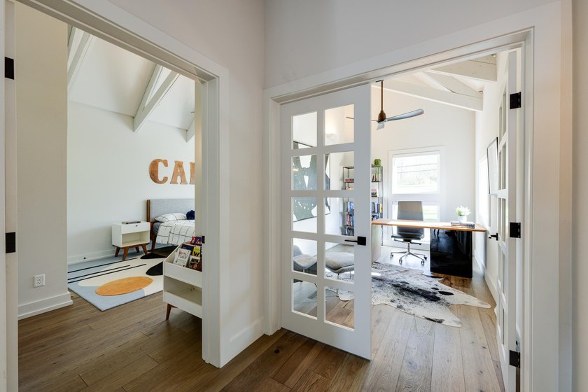 Lakefront luxury meets architectural distinction in this - photo 49