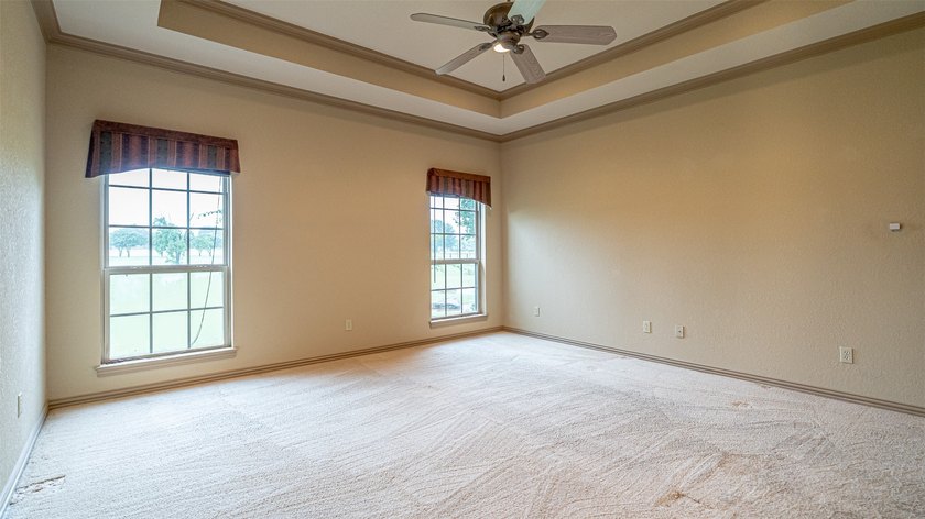 Beautifully maintained brick home with cut stone accents. Easy - photo 14