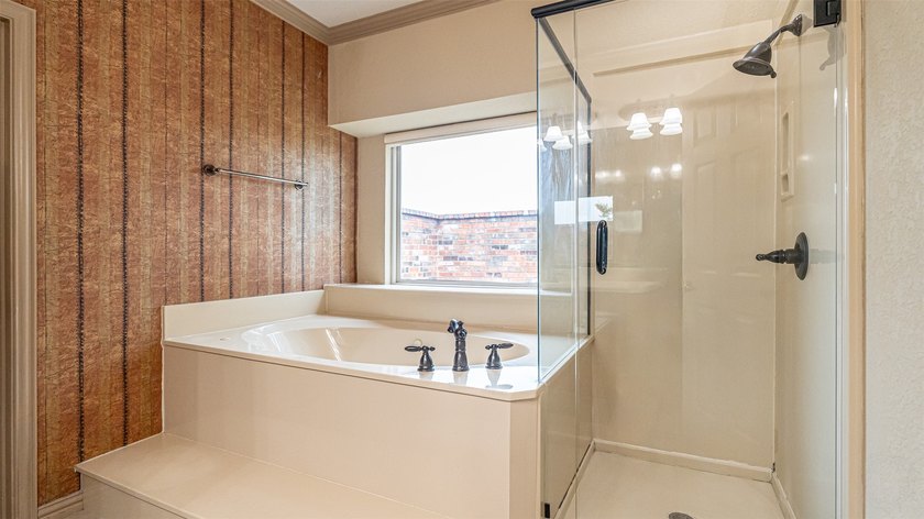 Beautifully maintained brick home with cut stone accents. Easy - photo 18