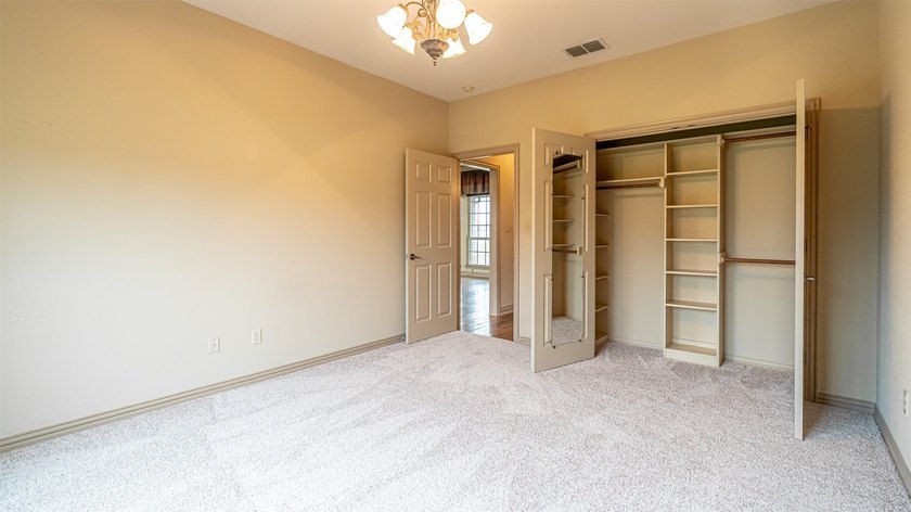 Beautifully maintained brick home with cut stone accents. Easy - photo 21
