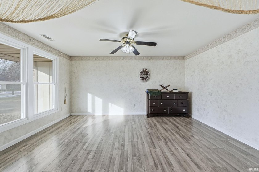Welcome to this well-maintained one-story home located in the - photo 3