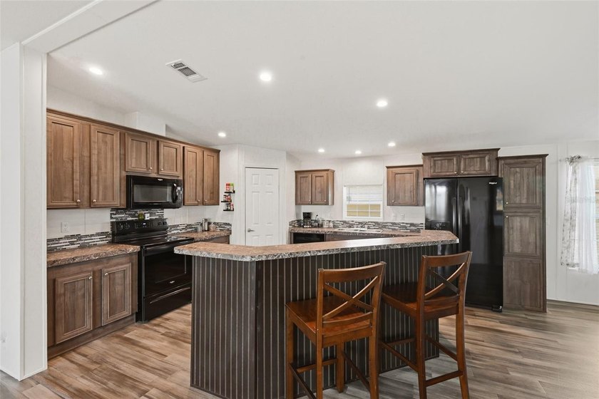 One of the largest floor plans in Broadmore Park! Offering 2,016 - photo 8