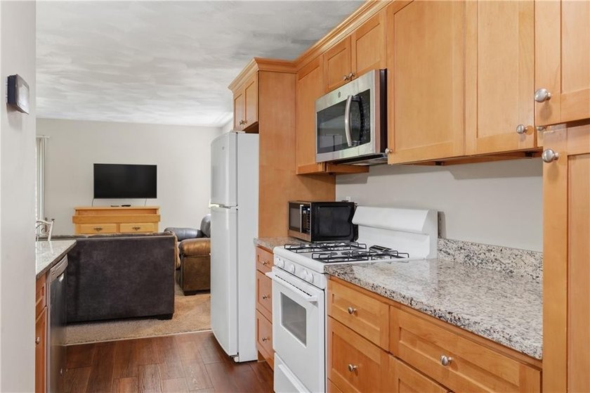 Welcome to this well-maintained 2-bedroom, 1.5-bath condominium - photo 8