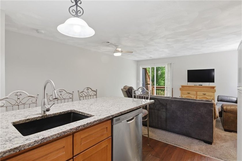 Welcome to this well-maintained 2-bedroom, 1.5-bath condominium - photo 10