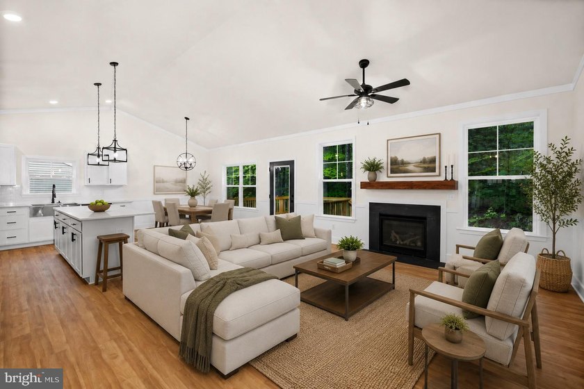 Nestled in the serene Lake of the Woods community, this stunning - photo 2