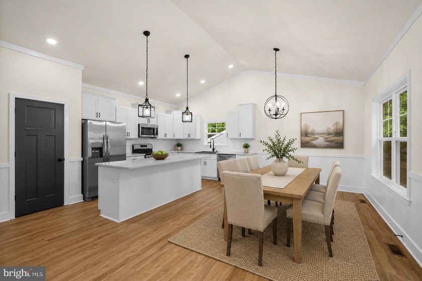 Nestled in the serene Lake of the Woods community, this stunning - photo 3