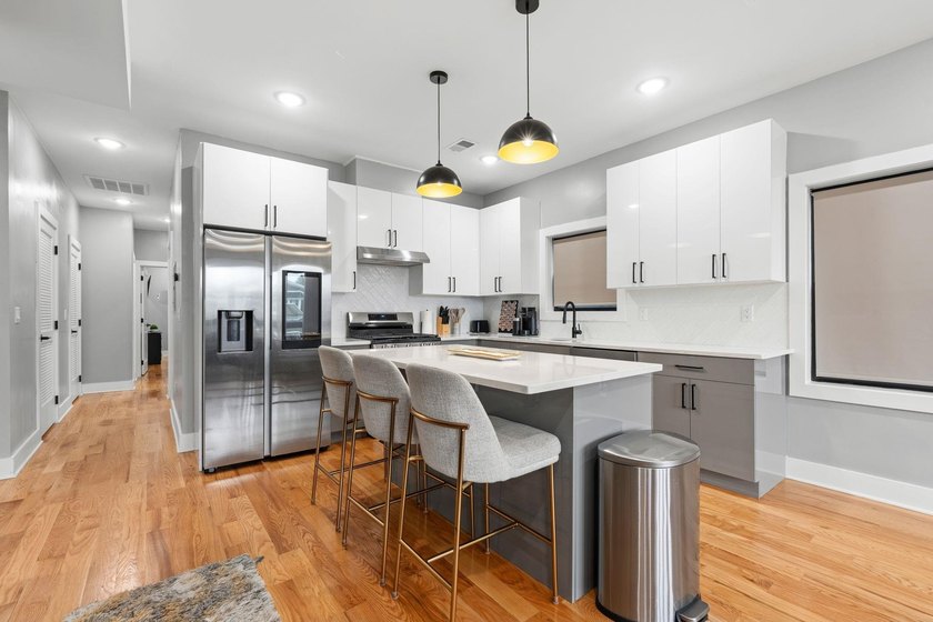Welcome to this refined 3-bedroom, 2-bathroom home offering - photo 3