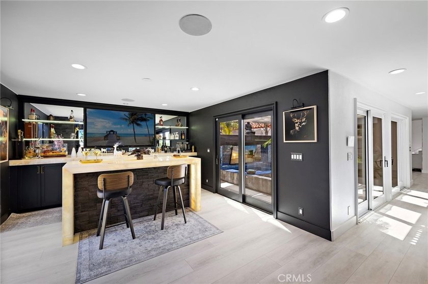 Welcome to modern, resort-style living on Lido Isle. Extensively - photo 17