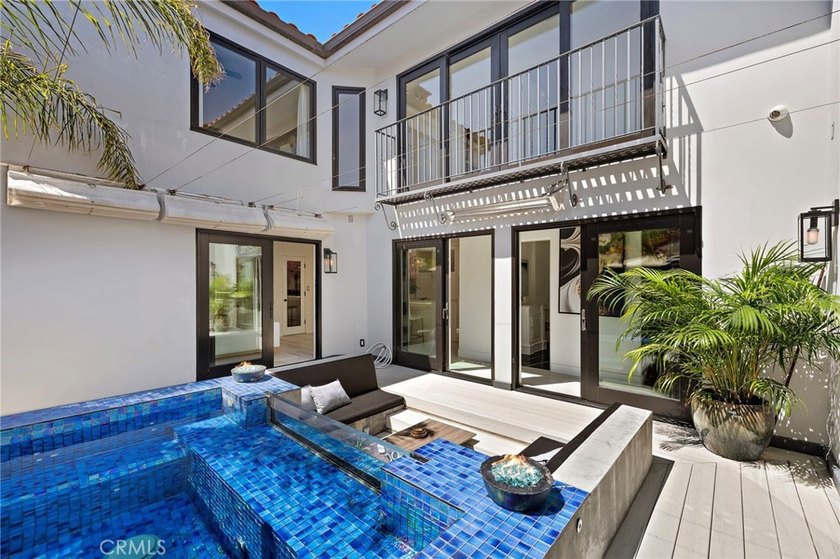 Welcome to modern, resort-style living on Lido Isle. Extensively - photo 21