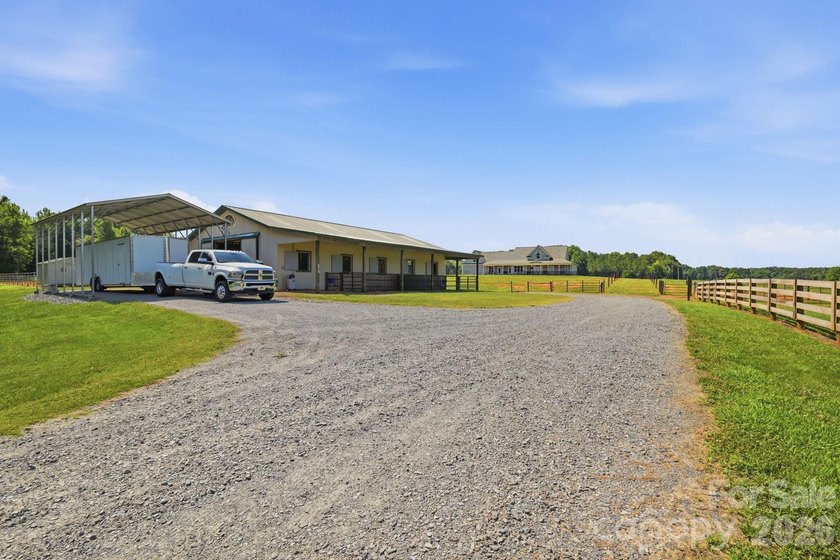 Just beyond a gated entrance and surrounded by beautifully - photo 33