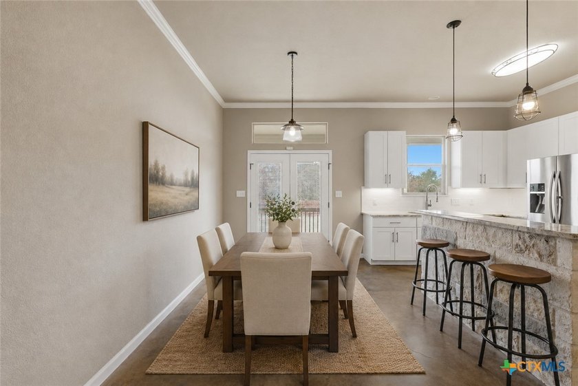 Set on a large 0.476-acre lot backing to a serene greenbelt - photo 3