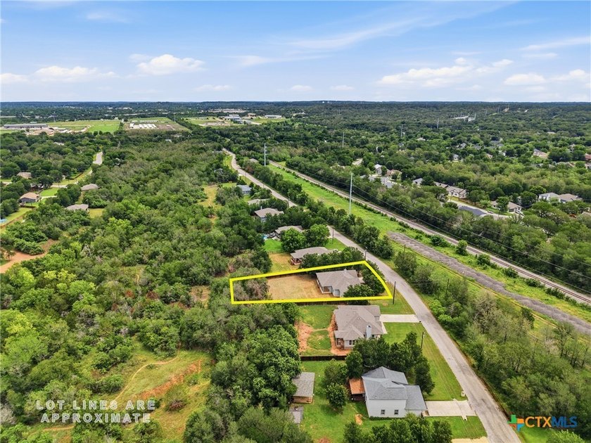 Set on a large 0.476-acre lot backing to a serene greenbelt - photo 6