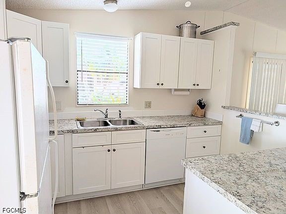Welcome to this charming and newly refreshed home located in the - photo 5
