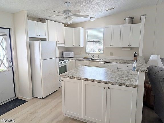 Welcome to this charming and newly refreshed home located in the - photo 6