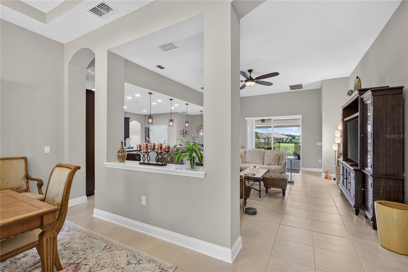Virtually Staged. Enjoy golf and water views from this - photo 5