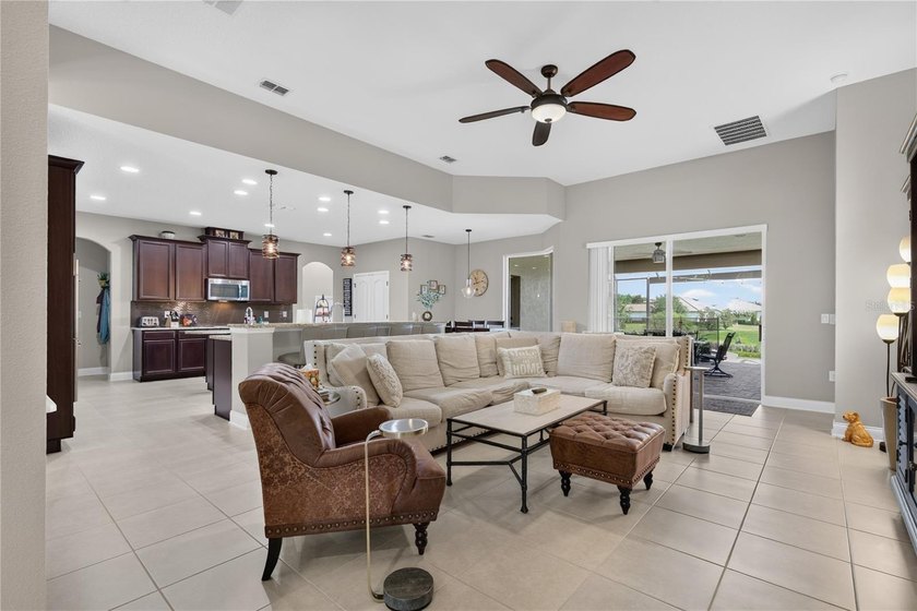 Virtually Staged. Enjoy golf and water views from this - photo 6