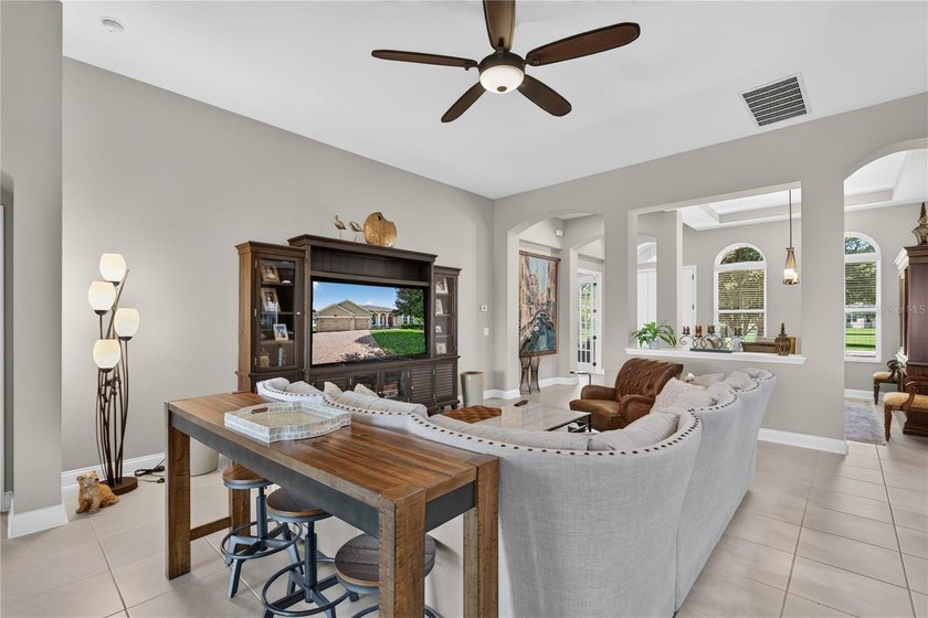 Virtually Staged. Enjoy golf and water views from this - photo 8