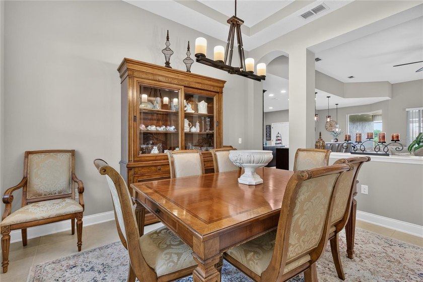 Virtually Staged. Enjoy golf and water views from this - photo 10
